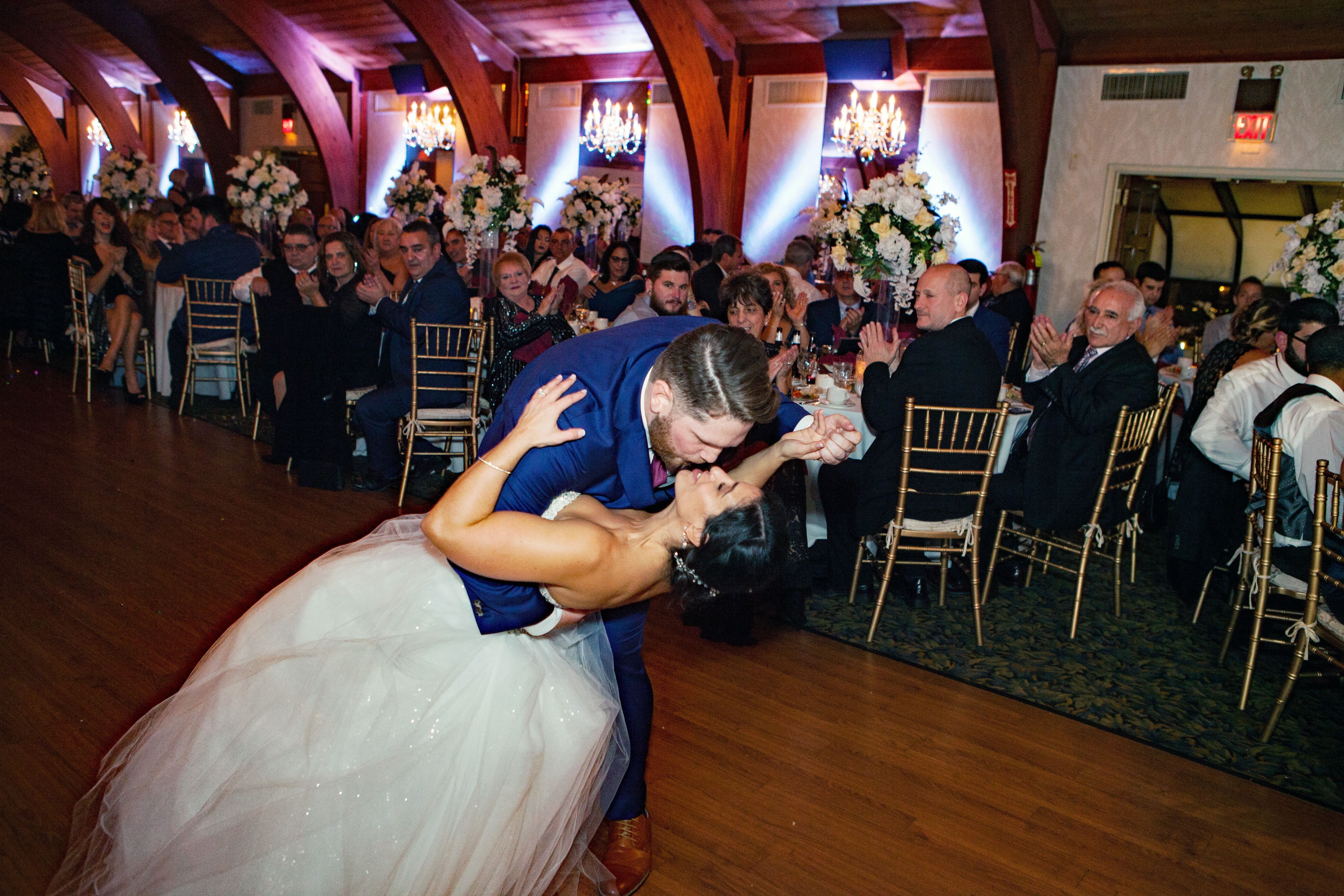 Groom dipping his bride. Photo by Tylerstar Productions.
